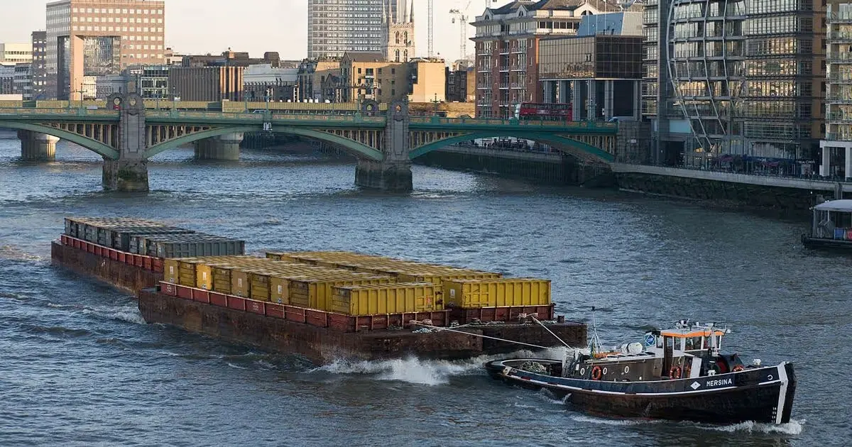 0 1200px barge on river thames london dec 2009