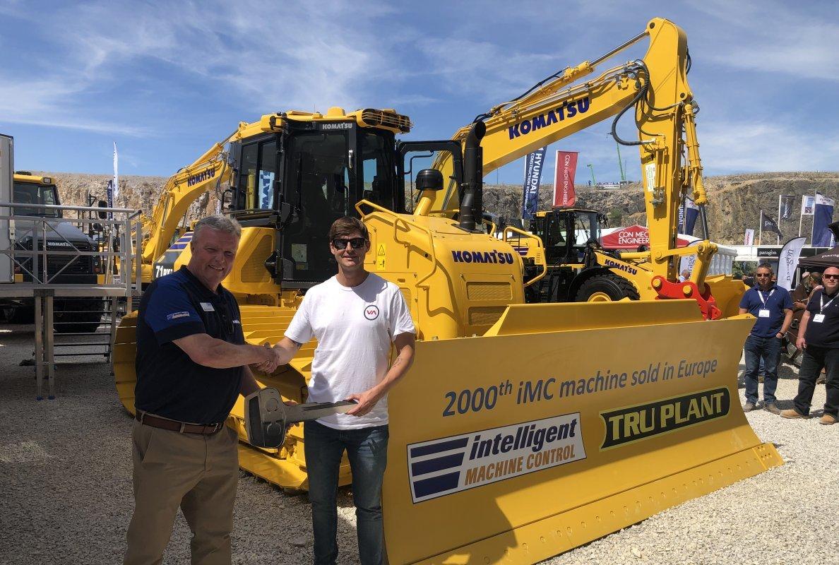 2000th imc machine handover eamonn delaney jake nicholls hillhead 2022 2d6