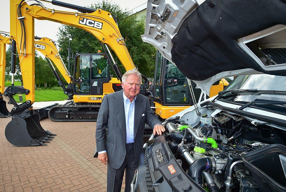 Lord bamford pictured with the retrofitted white van 239